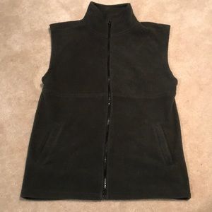 A dark first green vest